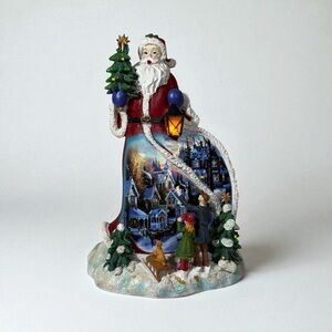 Vintage lighted santa figurine 10 inch holiday musical village statue